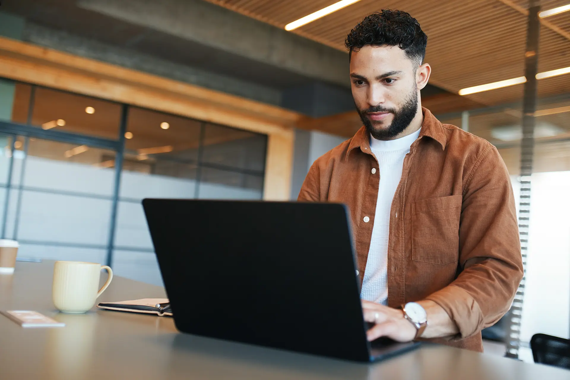 Man at desk on laptop