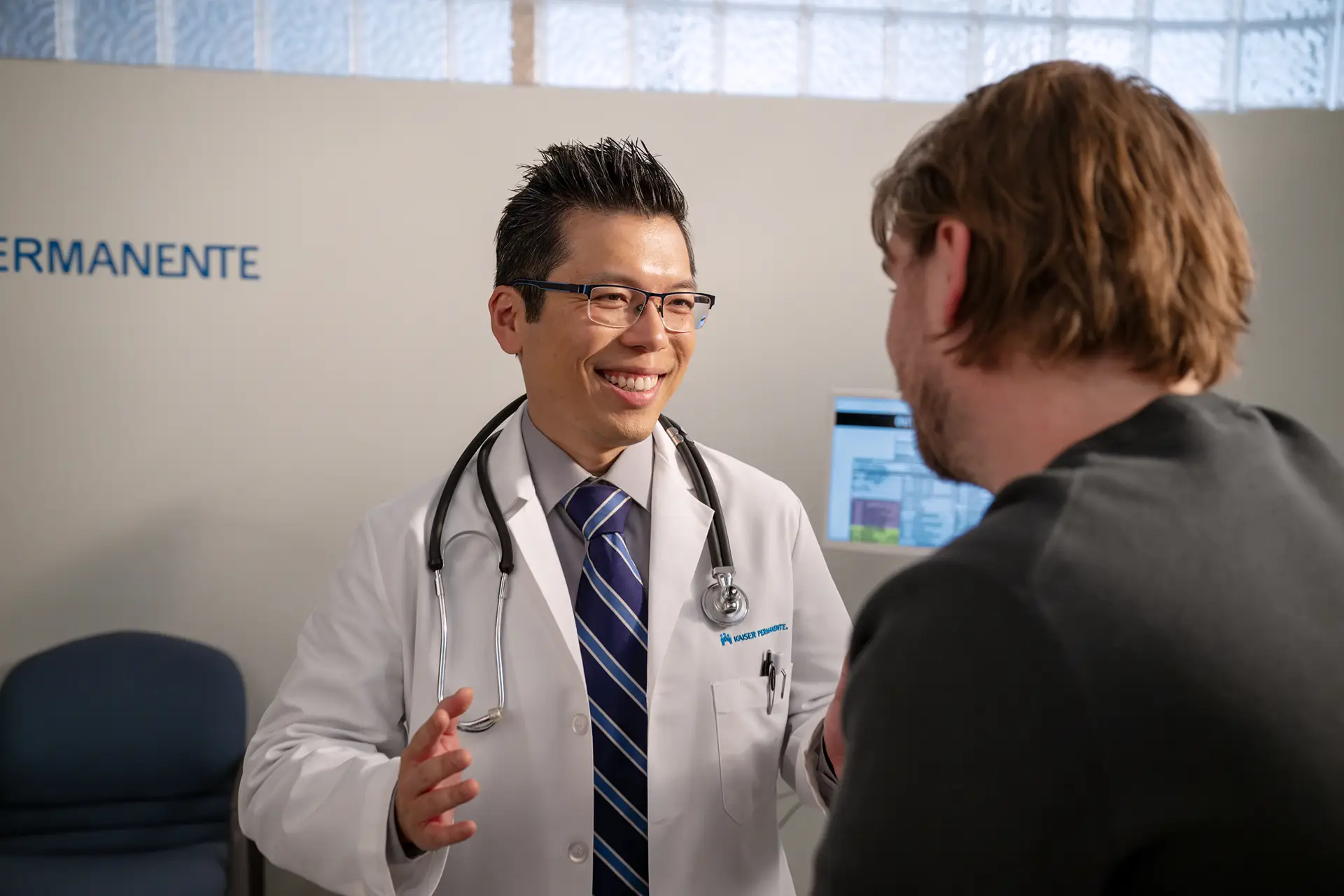 Physician meeting with patient